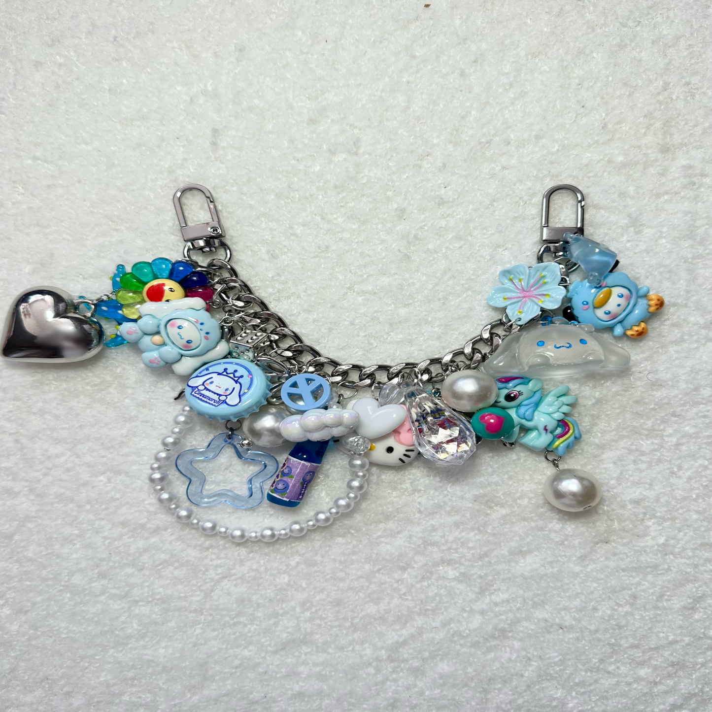 blue chained junk bag charm